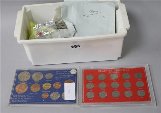 A collection of coins including two Henry VIII shillings